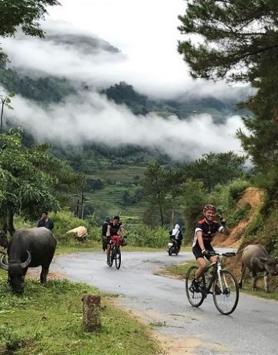 Andrew Mak Cycling on the  tour with redspokes